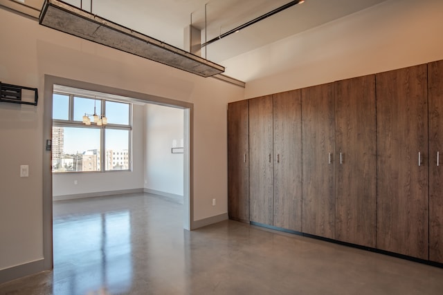 2987 Franklin St Unit 3Ab, Detroit, MI 48207 - garage featuring baseboards