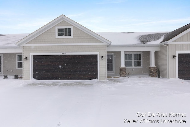 craftsman-style house featuring a garage