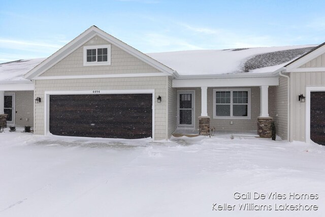 craftsman-style house with a garage