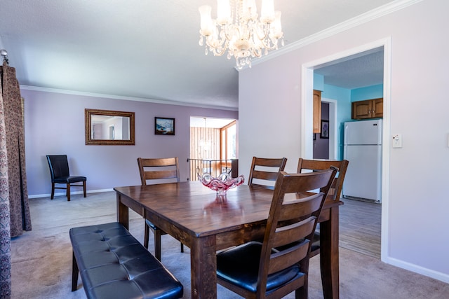 dining area with a textured ceiling, light colored carpet, crown molding, and a notable chandelier