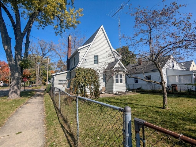 view of front of property with a front lawn