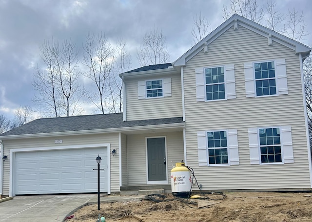 view of front of property featuring a garage