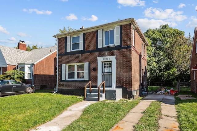 view of front of home featuring a front lawn