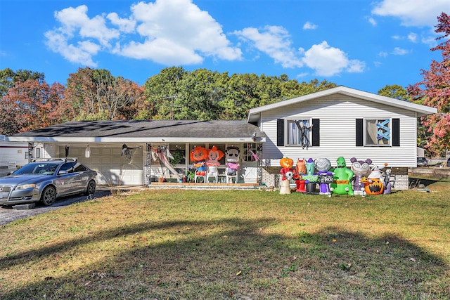 split level home with a front yard and a carport