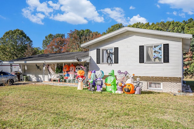 rear view of property featuring a yard