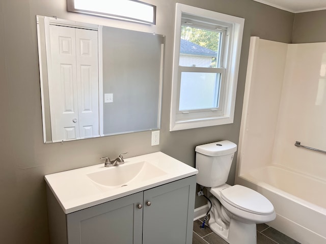 full bathroom with washtub / shower combination, vanity, and toilet