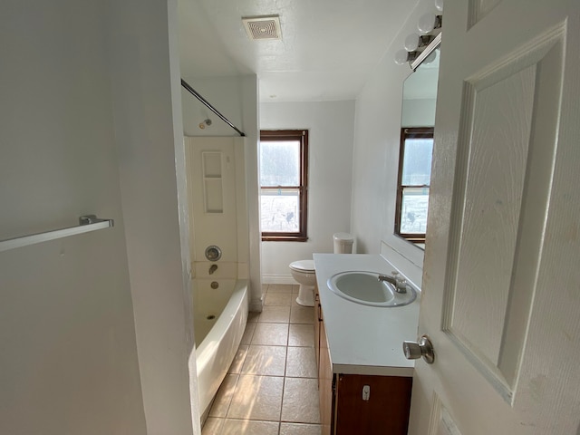 full bathroom featuring tile patterned flooring, vanity, toilet, and tub / shower combination