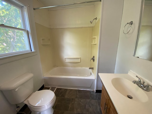 full bathroom with toilet, vanity, and bathing tub / shower combination