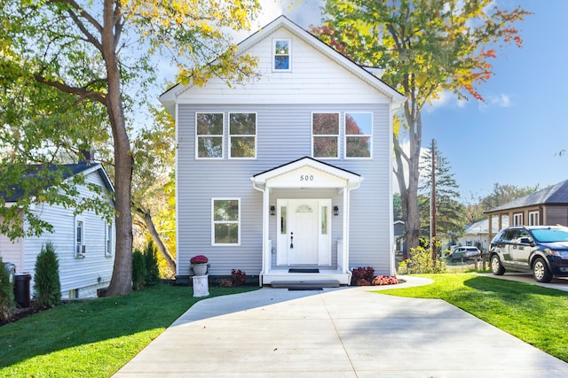 front of property with a front lawn