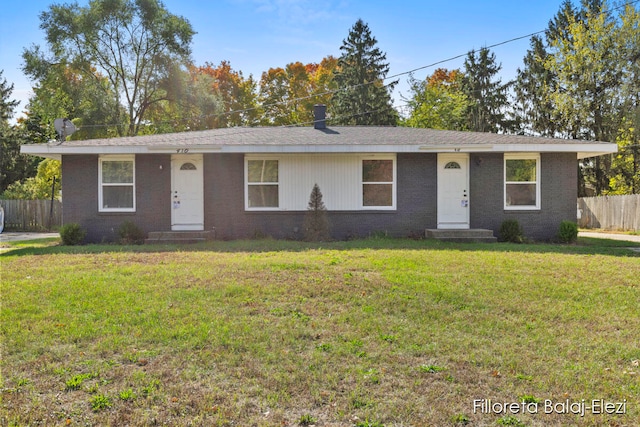 ranch-style house with a front lawn