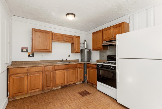 kitchen with sink, range with gas cooktop, white fridge, light parquet flooring, and water heater