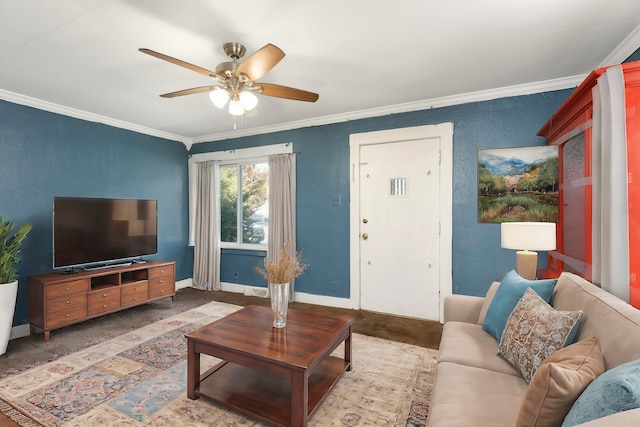 living room featuring crown molding and ceiling fan