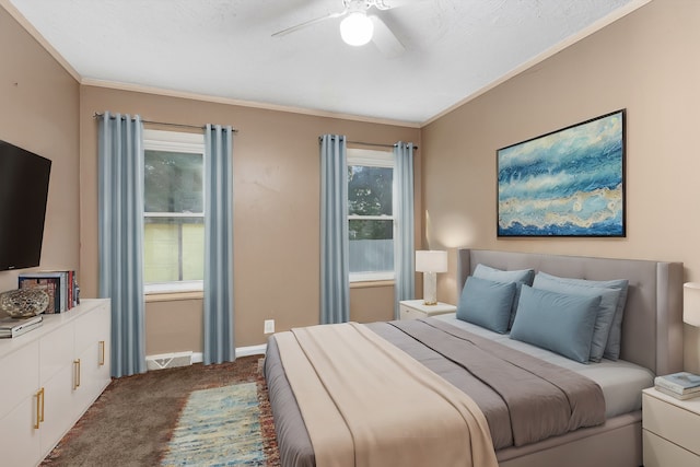 bedroom featuring crown molding, ceiling fan, and carpet floors