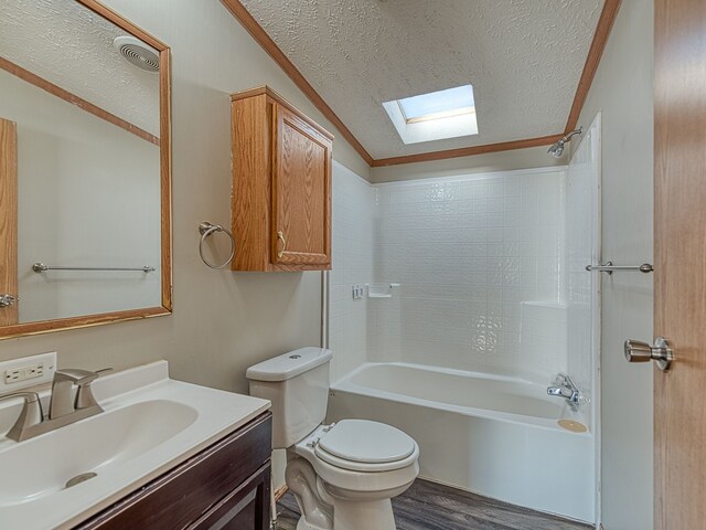 full bathroom with shower / tub combination, toilet, ornamental molding, a textured ceiling, and wood-type flooring