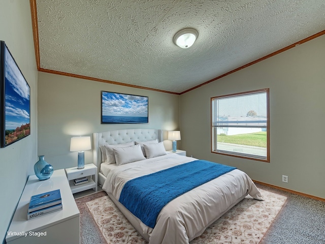 bedroom featuring ornamental molding, a textured ceiling, carpet floors, and lofted ceiling