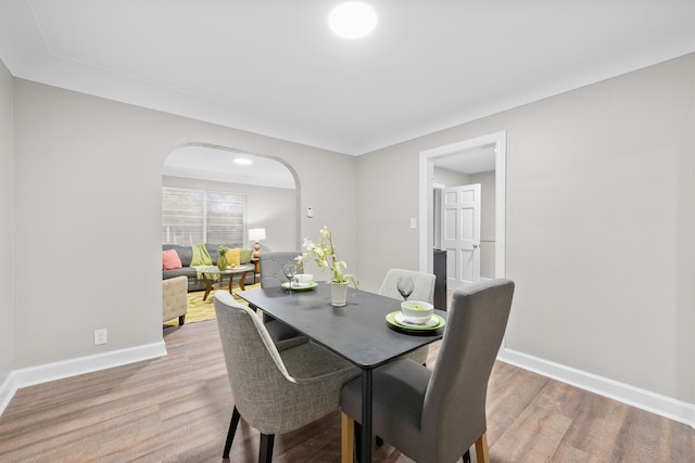 dining space featuring light wood-type flooring