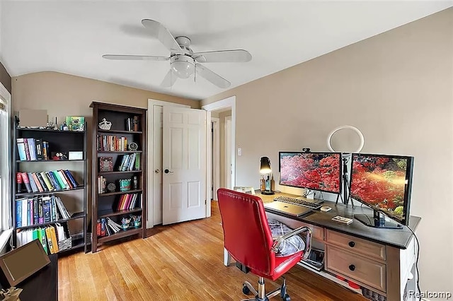 office with ceiling fan and light hardwood / wood-style floors