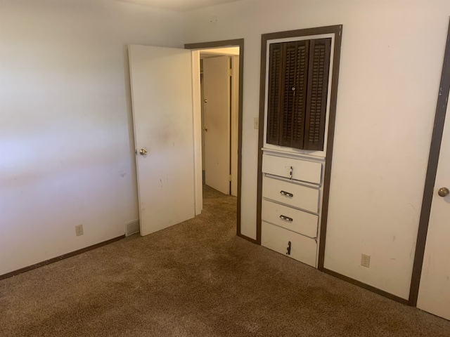 unfurnished bedroom featuring carpet floors