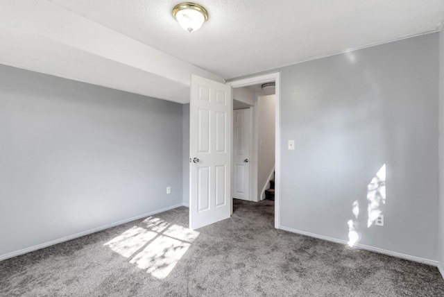 unfurnished bedroom featuring light carpet