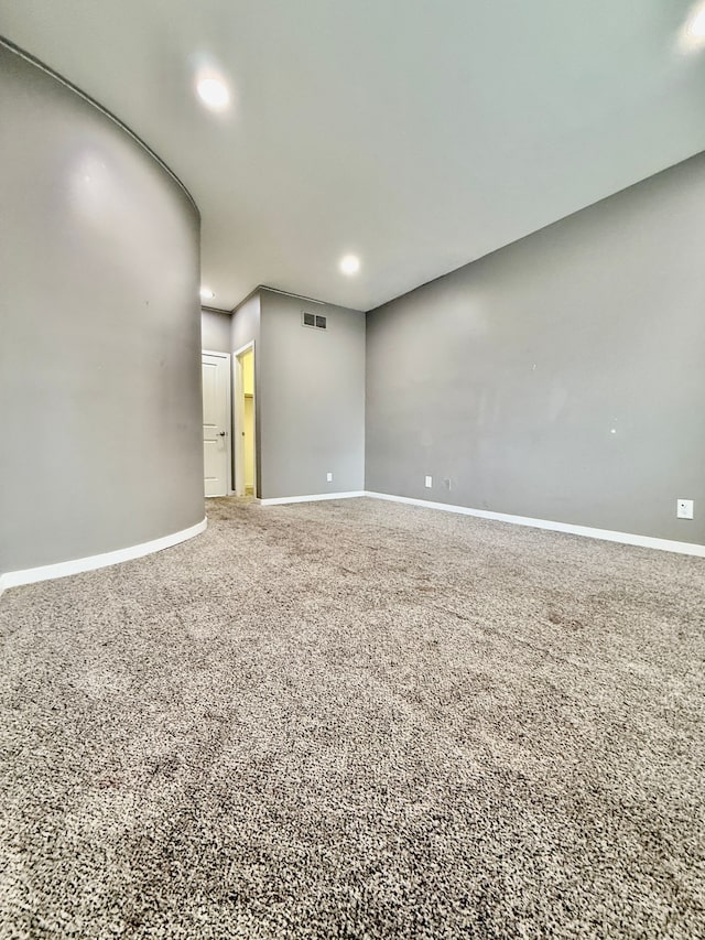 unfurnished room with carpet floors