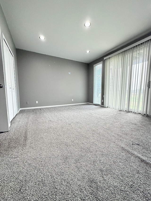 spare room featuring carpet floors