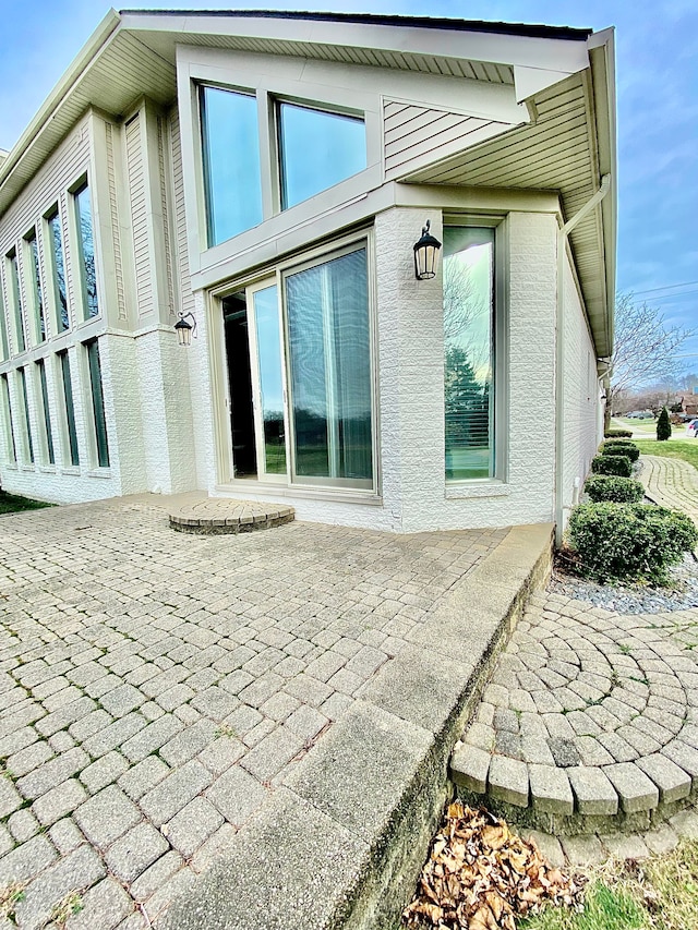 back of property with a patio area