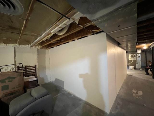 basement featuring heating unit