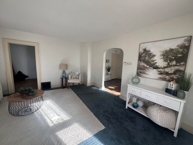 sitting room with carpet flooring