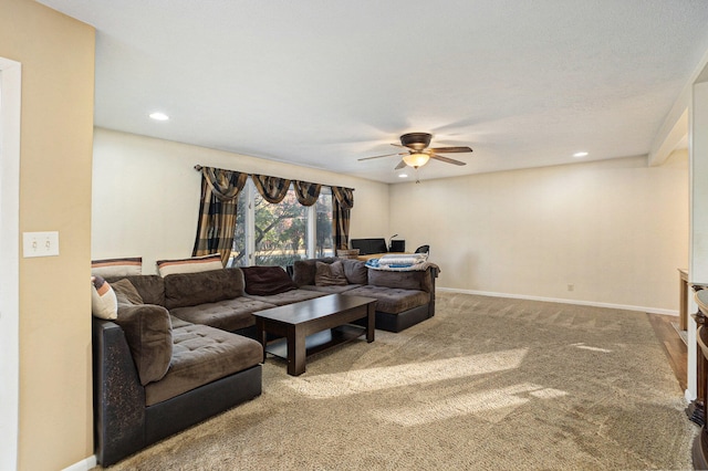 living room with carpet flooring and ceiling fan