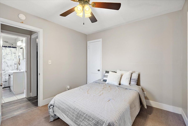 bedroom featuring light hardwood / wood-style flooring and ceiling fan