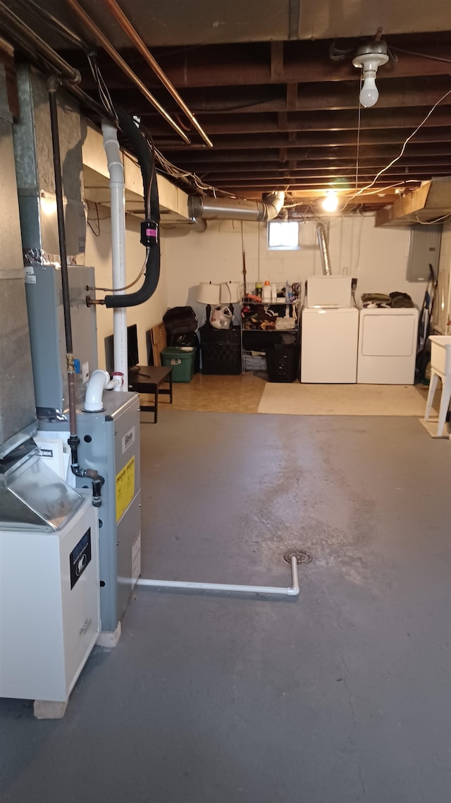 basement featuring washing machine and dryer