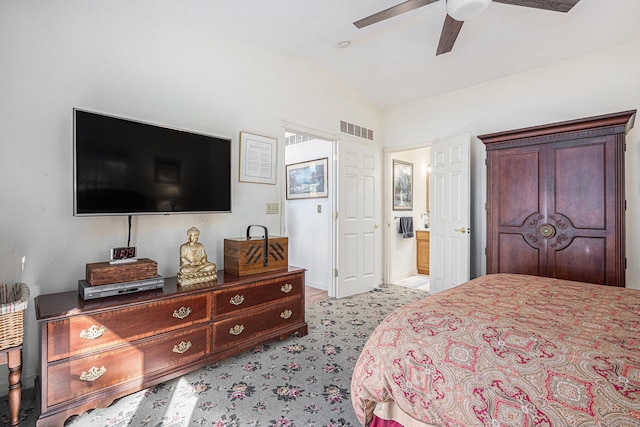 carpeted bedroom featuring ceiling fan and lofted ceiling
