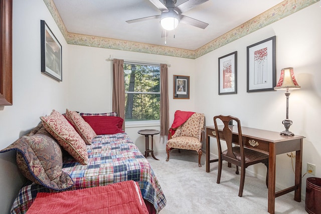 bedroom with ceiling fan and light colored carpet