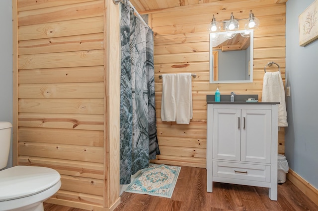 bathroom with walk in shower, vanity, hardwood / wood-style flooring, wooden ceiling, and toilet