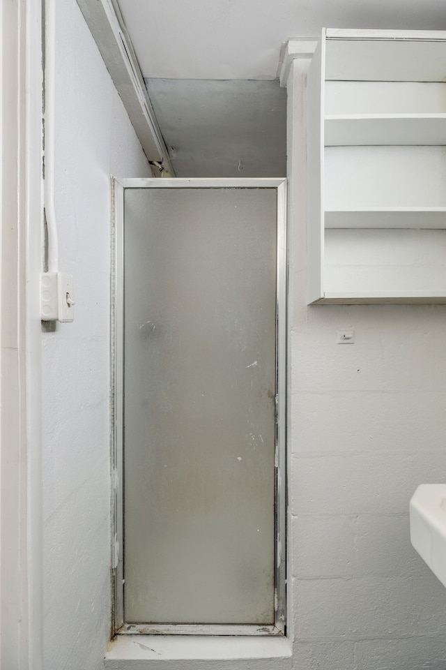 bathroom featuring walk in shower