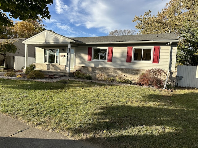 single story home with a porch and a front lawn