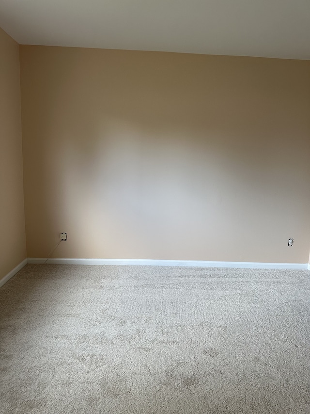 unfurnished room with carpet