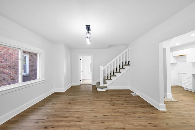 foyer featuring wood-type flooring