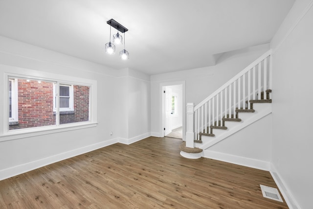 foyer with hardwood / wood-style floors