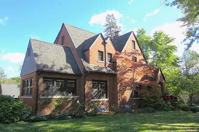 view of property exterior featuring a yard