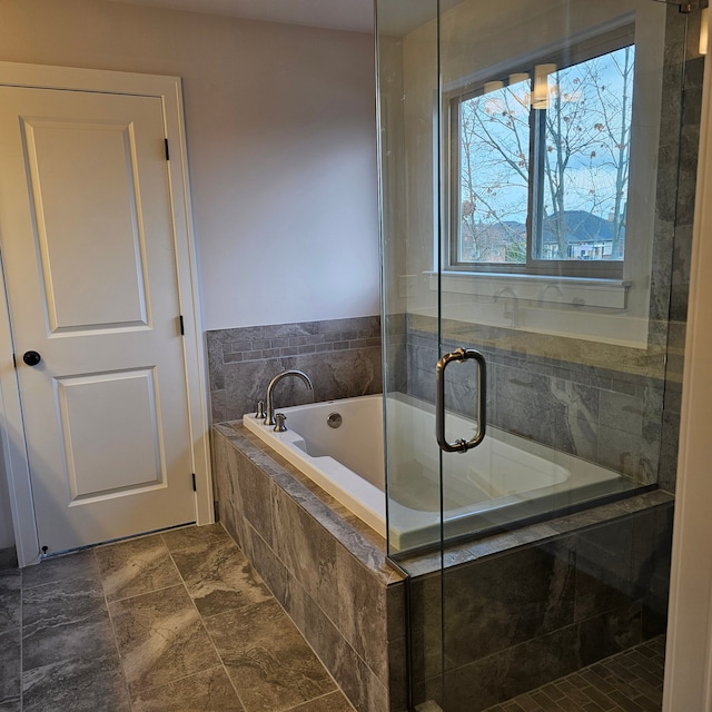 bathroom featuring plus walk in shower