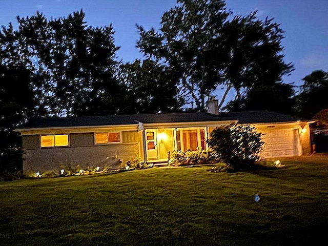 28164 Kendallwood Dr, Farmington Hills, MI 48334 - ranch-style home with a garage, a chimney, and a front yard