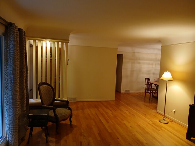 28164 Kendallwood Dr, Farmington Hills, MI 48334 - living area with wood finished floors and baseboards