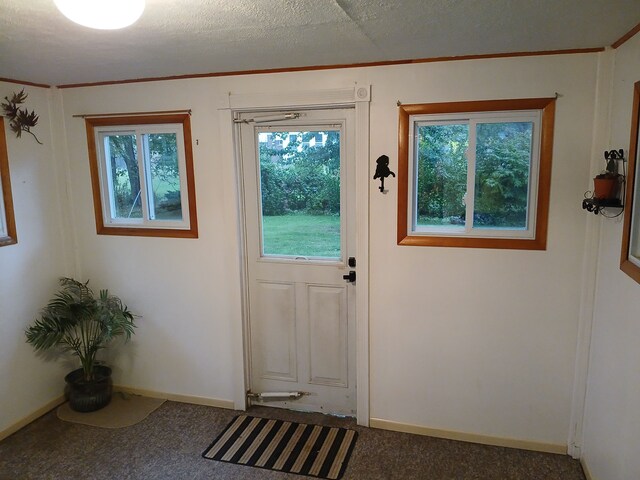 28164 Kendallwood Dr, Farmington Hills, MI 48334 - doorway featuring baseboards and crown molding