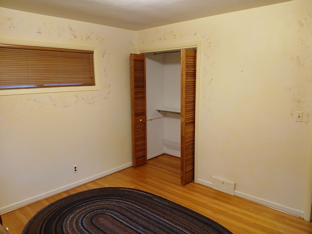 unfurnished bedroom with light hardwood / wood-style floors