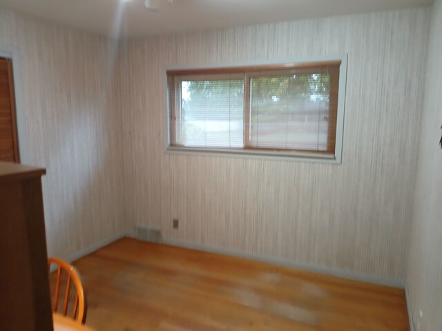28164 Kendallwood Dr, Farmington Hills, MI 48334 - spare room featuring wood finished floors and baseboards