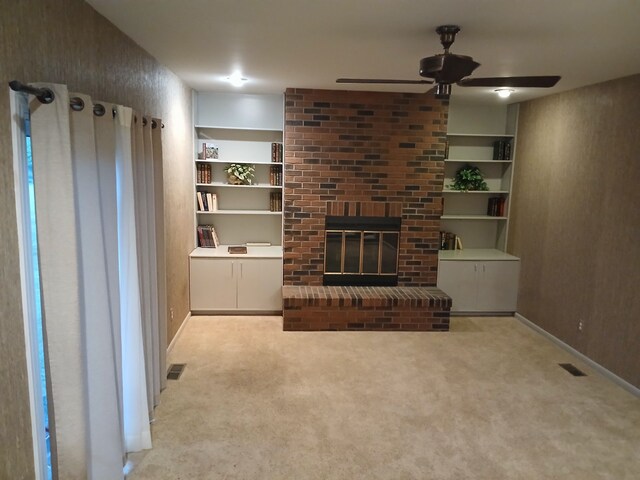 28164 Kendallwood Dr, Farmington Hills, MI 48334 - unfurnished living room with carpet flooring, a ceiling fan, baseboards, and a brick fireplace