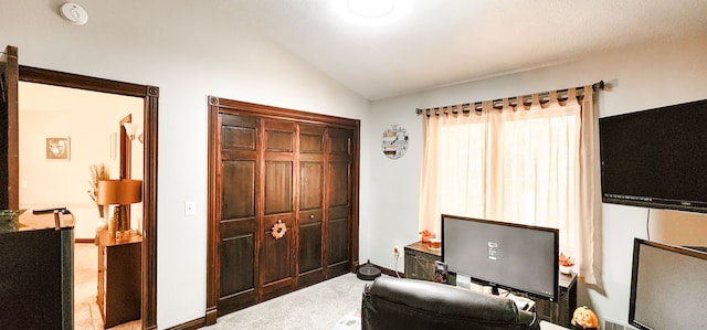 office space featuring carpet flooring and lofted ceiling