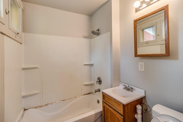 full bathroom with shower / tub combination, vanity, and toilet