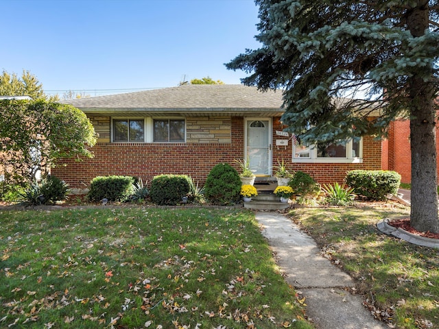 view of front of property with a front lawn